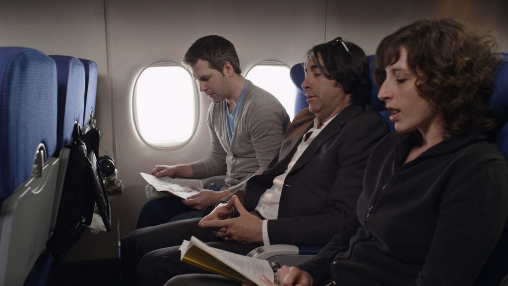 airplane passengers in a travel product drtv video for a case